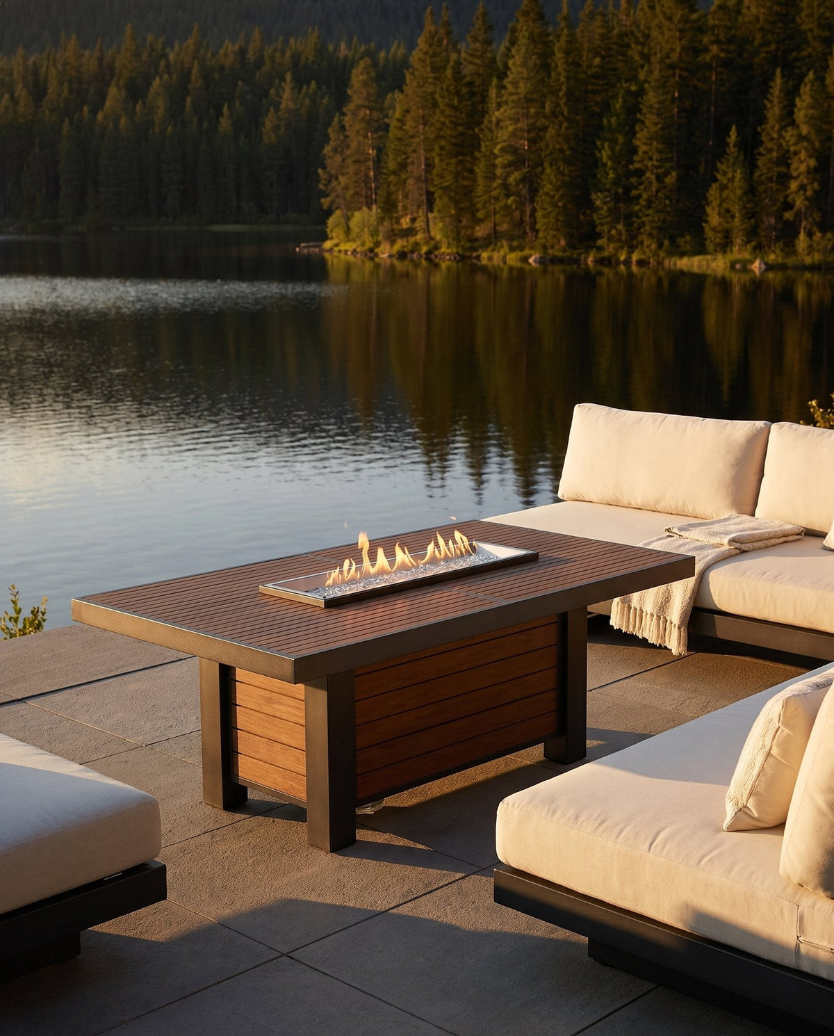 Outdoor GreatRoom Kenwood dining-height linear gas fire table on an outdoor patio