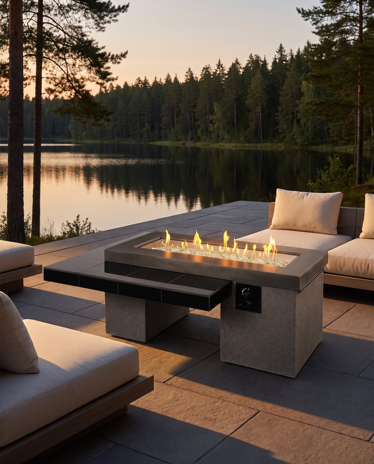 Outdoor GreatRoom Uptown modern linear gas fire table lit on an outdoor patio